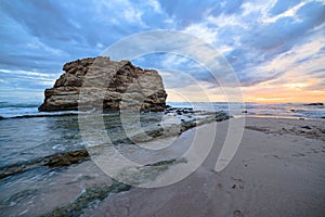 Big rock beach sunset long exposure