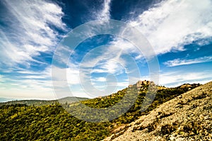 Big Rock Mountain (Pedra Grande) in Atibaia, Sao Paulo, Brazil with forest, deep blue sky and clouds