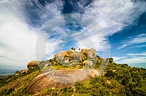 Big Rock Mountain (Pedra Grande) in Atibaia, Sao Paulo, Brazil with forest, deep blue sky and clouds