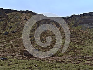 Big rocks that fell down during an earthquake near hiking trail at ÃžorbjÃ¶rn hill in SelskÃ³gur near Grindavik, Iceland.