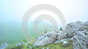 Big rocks on RoÅ¾anski kukovi, Velebit with a hiking trail.