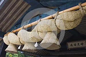 Big ropes hanging in front of shrine