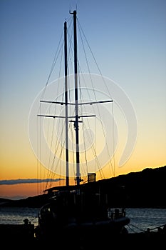 Big sail boat in sunset