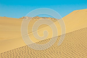 Big sand dunes panorama. Desert and coastal beach sand landscape scenery. Abstract background.