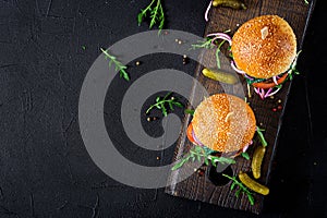 Big sandwich - hamburger burger with beef, tomato, basil cheese