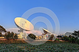 big Satelite dish or radio antennas to broadcast waves to astronomy