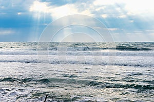 Big sea waves, big storm, weather elements on background of blue sky