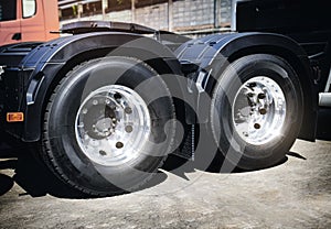 A Big Semi Truck Wheels and New Tires. Freight Truck Transportation.