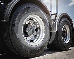 Big Semi Truck Wheels Tires. Rubber, Vechicle Tyres. Freight Trucks Transport Logistics photo