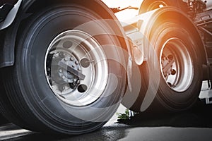 Big Semi Truck Wheels Tires. Rubber, Vechicle Tyres. Freight Trucks Transport Logistics photo