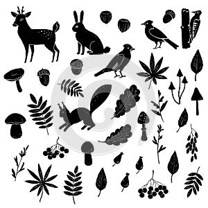 Big set of black and white silhouettes of forest animals, birds, mushrooms and berries.