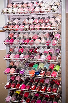 Big set of bright nail polishes for manicure, multicolored nailpolish photo