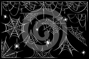 big  set of cobwebs and hanging spiders silhouette isolated on black. line art of spider webs and spiders for halloween.