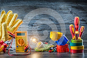 Big set of electric tools on vintage wood