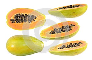 Big set of half cut and whole papaya fruits isolated on white background