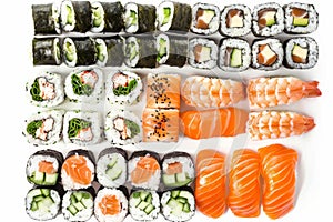 Big Set of Various Maki Sushi Isolated on White Background Top View. Baked Norimaki Rolls