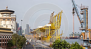 Big ship loading container in shipping port in Singapore