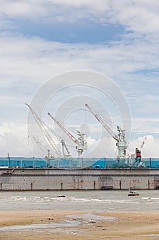 Big shippingbuilding with a lot of crane in the gulf of Thailand