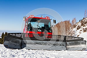 Big shovel on snowmobile