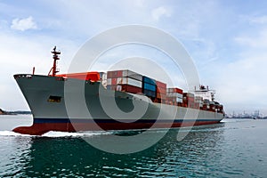 Big size container ship full speed sailing in deep sea for transporting cargo logistic import and export goods internationally