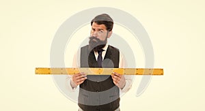 Big size. Measure and control. bearded man with ruler isolated on white. Size tall and length. Geometry theorem concept