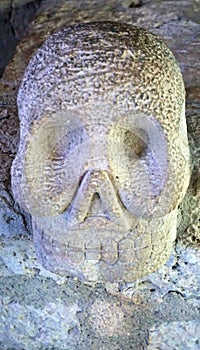 Ancient mayan stone skull photo