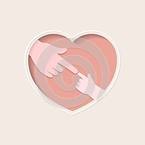 Big and small index fingers touching in heart shaped paper cutting art photo