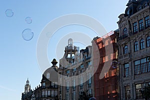 Big soap bubble and Porto city in the background. Aliados Avenue