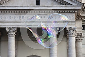 Big soap bubbles in front of the church Santa Maria photo