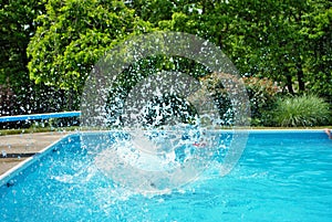 Big splash after someone jumped off the diving board