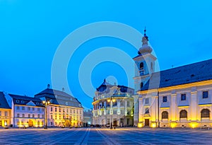 The Big Square with the Citty Hall in Sibiu at sunrise in Transylvania region, Romania photo