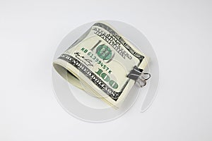 Big Stack of Folded Hundred Dollar Bills Isolated on White Background