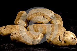 A big stack of potato russet`s