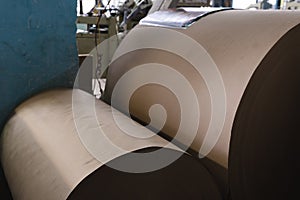 Big Stack of Printing Paper Rolls in Warehouse. The concept of production of paper and paperboard