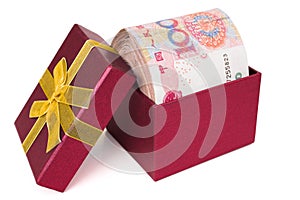 Big stack of RMB in a red present box