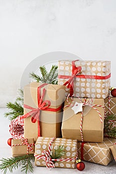Big stack of wrapped Christmas gift boxes, toys and decoration