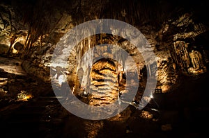 Big Stalagmite column Formations in the Cave photo