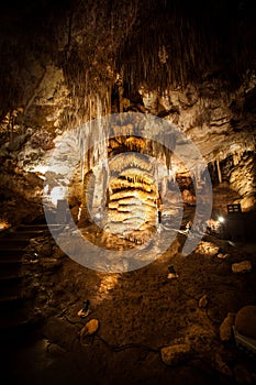 Big Stalagmite column Formations in the Cave photo