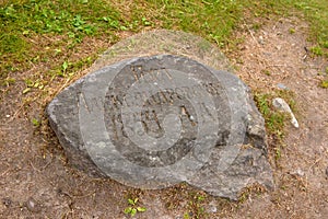 Big stone with the inscription Mount Alekseevskaya 1854
