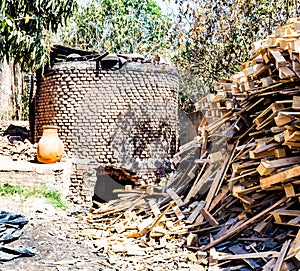 Big stone outside brick oven for baking chimeneas in Mexico photo