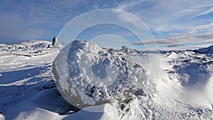 Big Stone snow art on Mount Hoven in Loen in Vestland in Norway