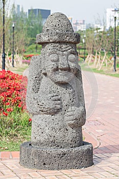 Big stone statue of hareubang Jeju island idol, shot in Yurim pa