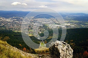 Big stone on top named Jested above Liberec city at autumn photo