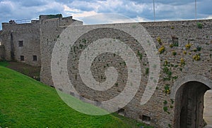 Big stone walls and gate at Dinan fortress, France