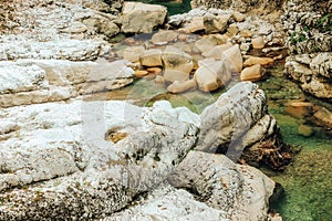 Big stones near waterfall closeup in Martvili canyon, Georgia