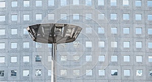 Big streetlight in a business district in front of a skyscraper