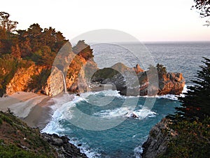Big Sur Pacific Coast in Evening Light with McWay Falls and Little Cove in Julia Pfeiffer Burns State Park, California