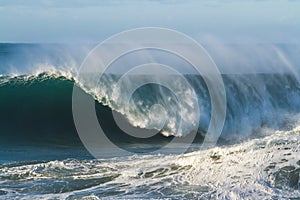 Big surf wave breaking as a barrel