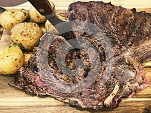 Big T-bone steak With Potatoes