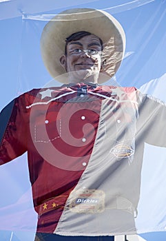 Big Tex and Texas state flag